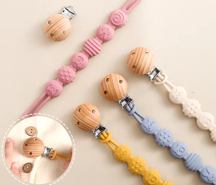 Prendedor de Chupeta em Silicone com Mordedor - Pequenas mãos